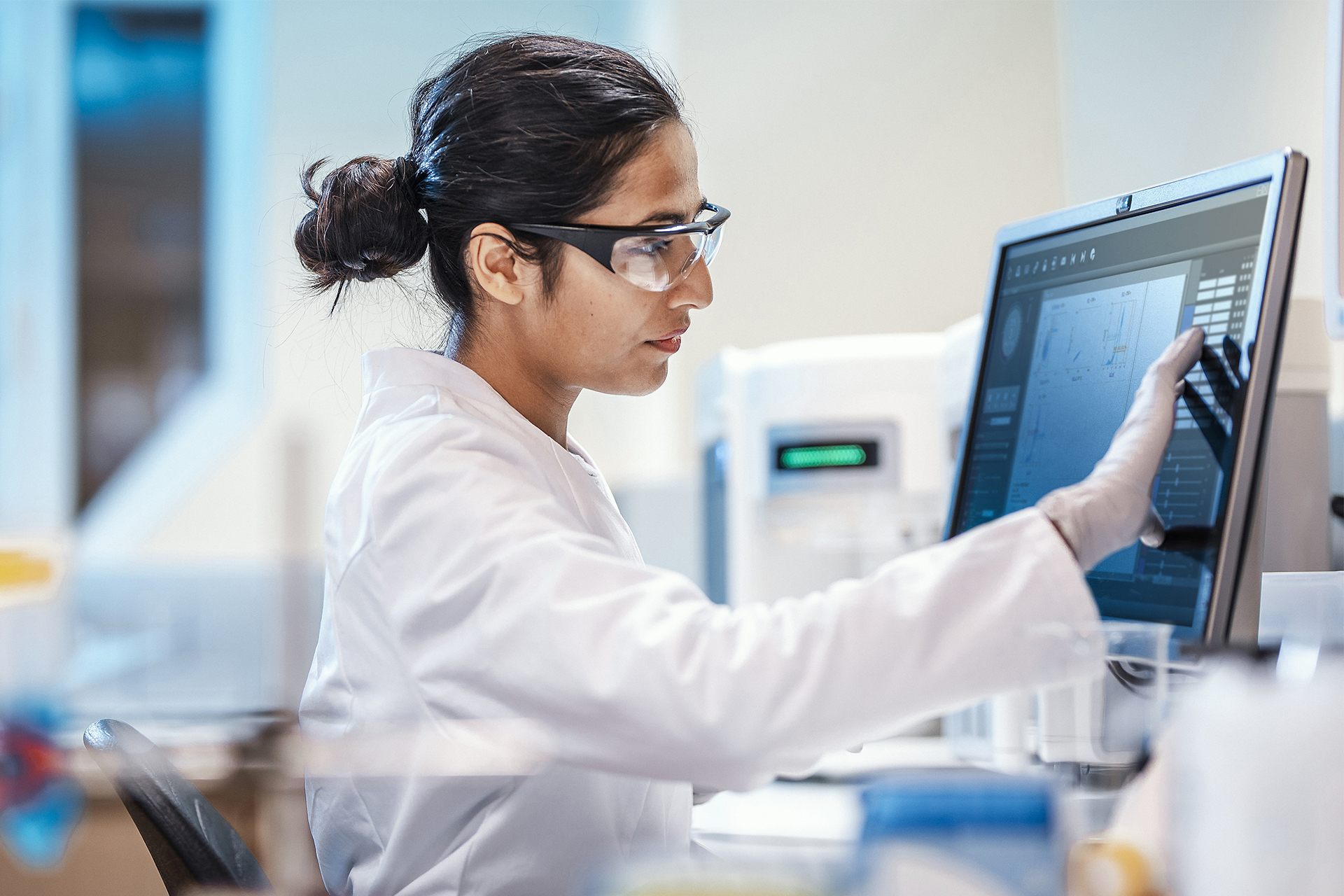 Female Scientist Working in The Lab, Using Computer